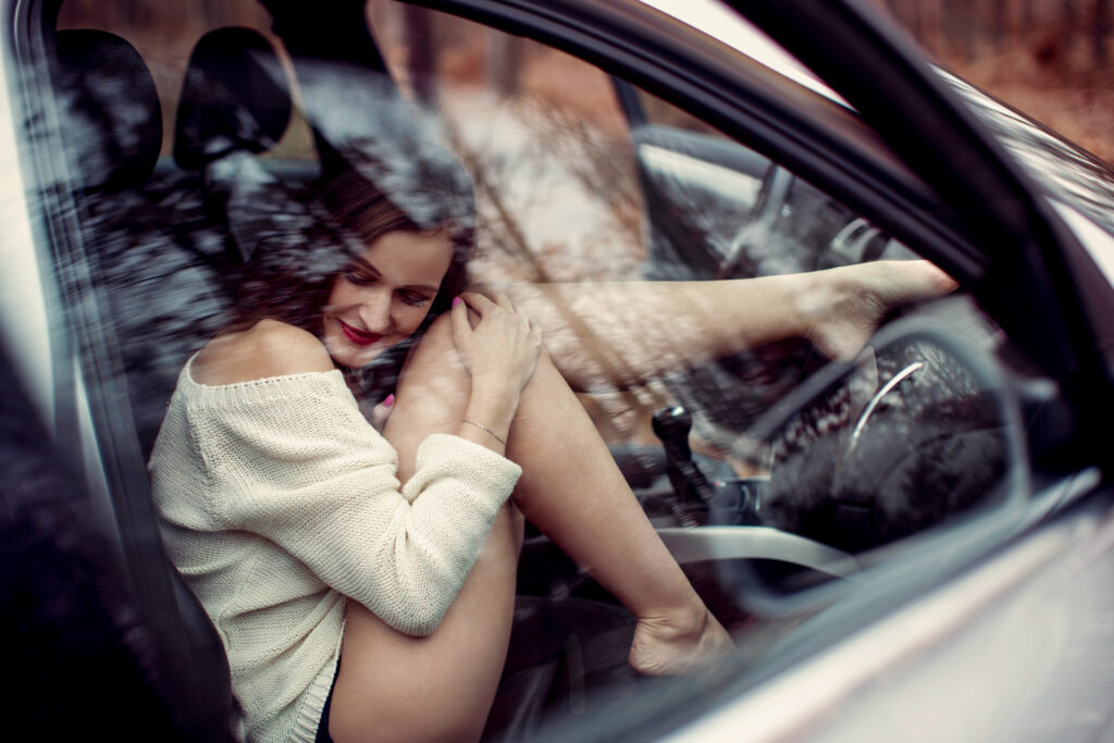 Woman in a car – boudoir photography by Takács Bori, Budapest