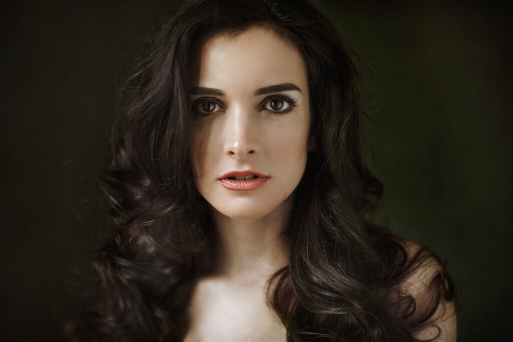 Portrait of a woman with long dark hair – glamour photography by Takács Bori, Budapest