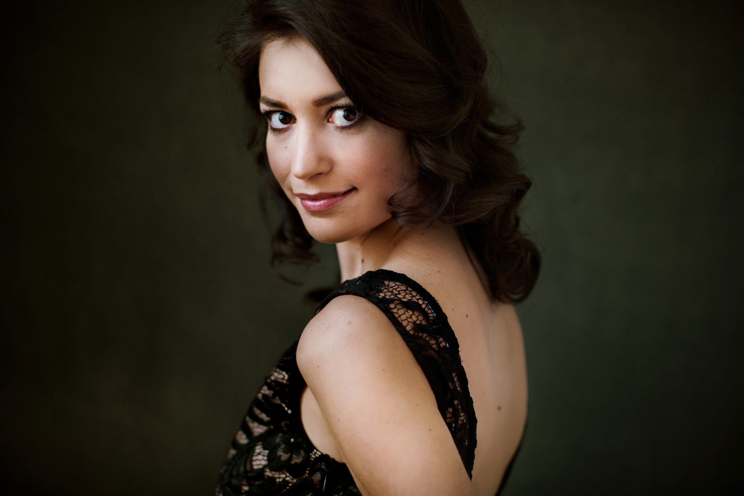 Dark-haired woman in a black lace dress – glamour photography by Takács Bori, Budapest