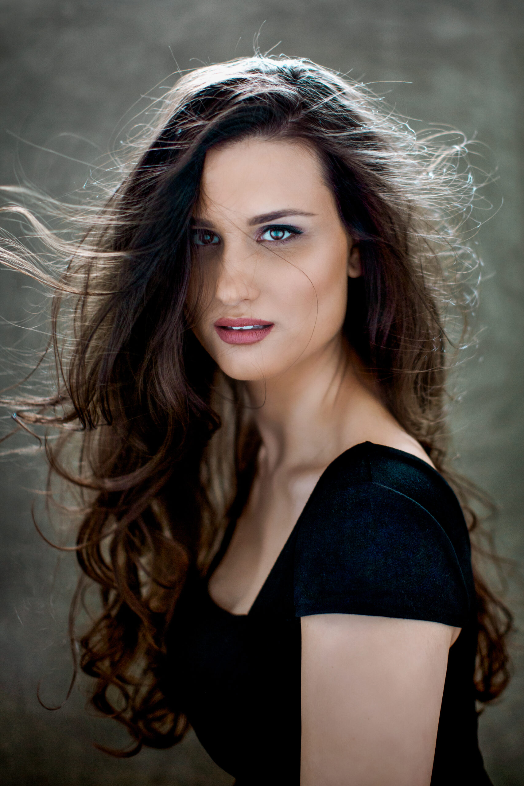 Woman with long dark hair – glamour photography by Takács Bori, Budapest